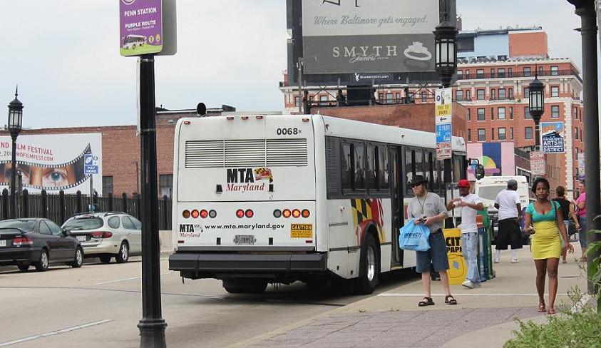 "Arsenal of Exclusion": this bus stop on Charles St. outside Penn Station serves the MTA and Charm City Circulator. It's separated by half a block from the Johns Hopkins Shuttle. Below is a bus stop that serves everyone, on the St. Paul side of Penn Station. Credit: Lawrence Lanahan.