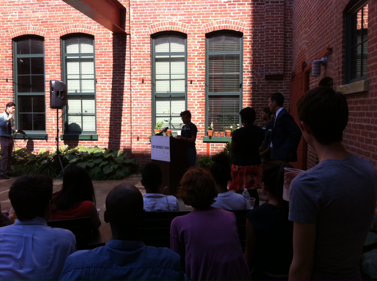 Baltimore City College student Taikira White speaks at Miller's Court in Remington, June 25, 2013.